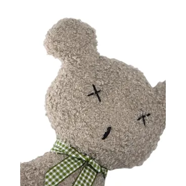 Zoom texture bouclée peluche ours