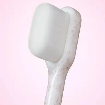 Détails des poils ultra doux de la brosse à dents pour chien